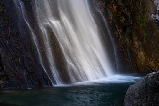 Photograph of the textures of a waterfall.