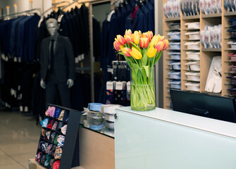 men's clothing store and flowers