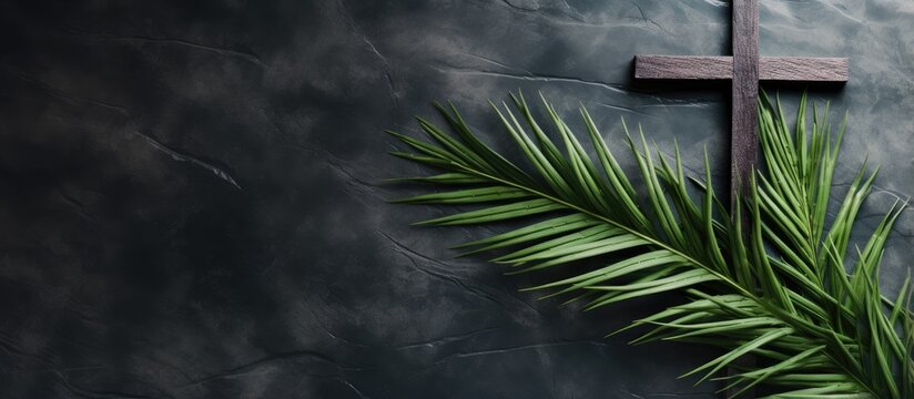 Christian observance of Lent Holy Week and Good Friday with palm leaves and cross on stone background