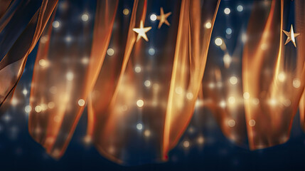 Orange tinsel and golden stars on dark blue background with bokeh effect, perfect for festive events and marketing materials