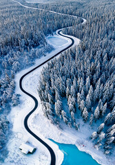 Aerial view of a road through a snow covered landscape