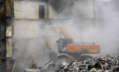 demolition of destroyed and burnt houses in Ukraine during the war