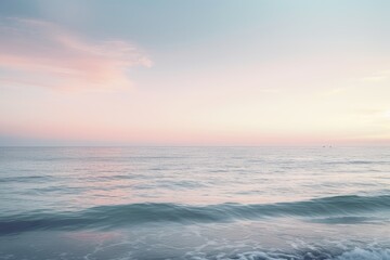 Fototapeta na wymiar A calming background image showcasing a soft pastel sunset