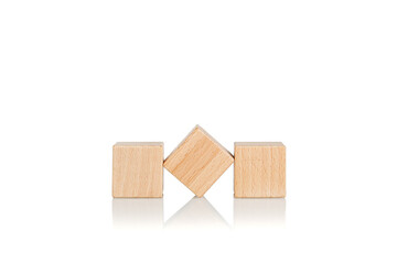 wooden cubes three 3 pieces on an isolate white background