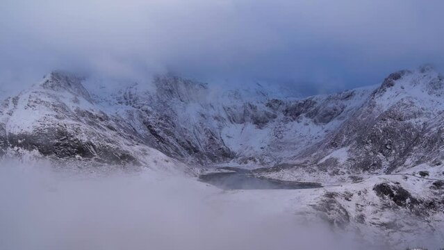 Incredible mountain weather around a view of Llyn Idwal and the Glyderau of Snowdonia National Park