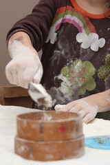 A person making dough