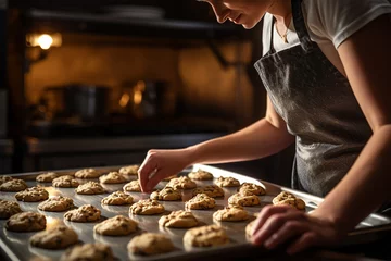 Foto op Plexiglas woman baking cookies homemade, fresh tray of cookies, rustic, homemade recipes © castecodesign