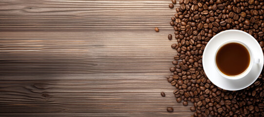 Coffee beans on wooden background. Top view with copy space