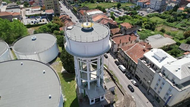 Aerial circle view of the large water tanque in the city, the water reservoir in Porto town. Portugal 