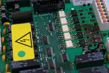 Detail of a circuit board with transistors.