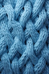 Background of blue wool knitted jumper.  - obrazy, fototapety, plakaty