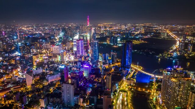 Time Lapse, Hyperlapse Aerial view of beautiful night traffic and city lights in Ho Chi Minh City, Vietnam.
