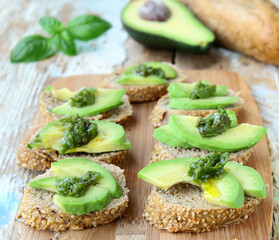 sandwiches with avocado and pesto sauce