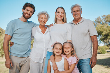Nature portrait, hug and happy family children, parents and senior grandparents enjoy reunion with mom, dad and kids. Park, love and relax people bonding, care and embrace young sisters in Australia