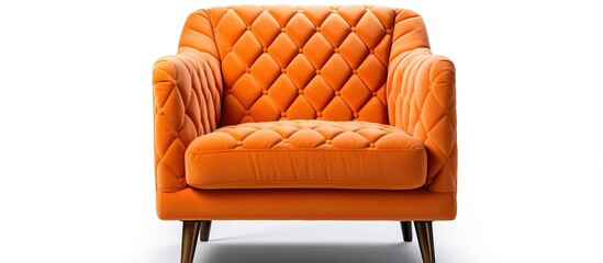 Art deco style armchair in orange quilted fabric with brass legs isolated on white background Front...