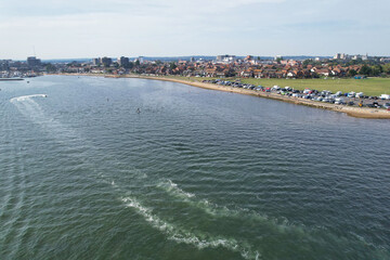 Aerial  Footage of People are Enjoying Boat Ride Over British Tourist Attraction and Ocean Sea View...