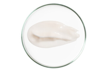 Fototapeta na wymiar Petri dish isolated on empty background. A smear of cosmetic cream in a Petri dish.