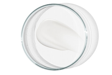 Petri dish isolated on empty background. A smear of cosmetic cream in a Petri dish.