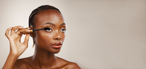 Mascara, black woman and makeup in studio for beauty, cosmetics and mockup space on brown...
