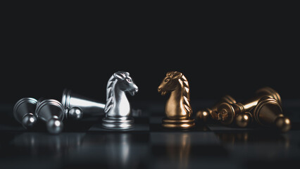 Gold and silver chess pieces in chess board game for business comparison. Leadership concepts,...