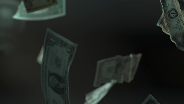 Falling Dollar banknotes. Dollar bills falling rain