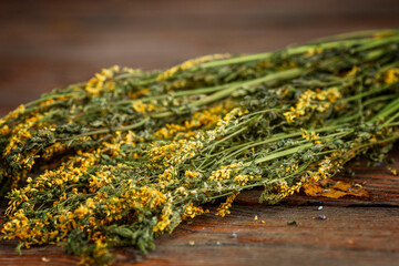 A bunch of dry St. John's wort herb. Health and natural medicines. Close-up.