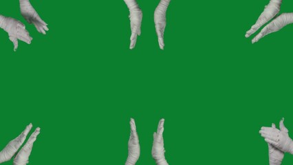 Detail green screen isolated chroma key photo capturing lots of mummies' hands clapping all around the frame.
