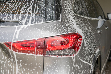 car cleaning and washing with foam soap
