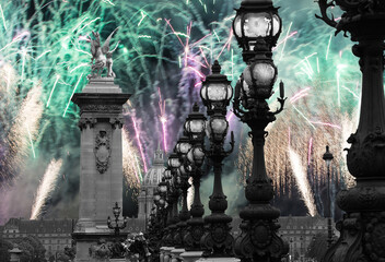 Celebratory colorful fireworks over the Lamp posts on Alexander III Bridge. Paris, France. This...