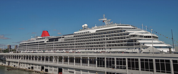 Partly view of Carnival cruiseship cruise ship liner Splendour in port of New York City, Manhattan terminal berth - obrazy, fototapety, plakaty