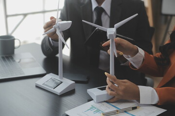 Entrepreneurs and business people conference in modern meeting room, happy multiracial coworkers have fun cooperating working together at office meeting, asian teamwork concept