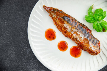 mackerel in tomato sauce and basil fresh canned fish delicious seafood healthy eating cooking appetizer meal food snack on the table copy space