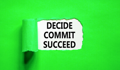 Decide commit succeed symbol. Concept word Decide Commit Succeed on beautiful white paper. Beautiful green table green background. Business decide commit succeed concept. Copy space.