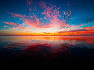 Sunset on the beach with clouds