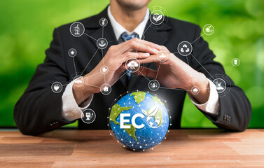 Businessman's hand holding Earth globe symbolize corporate commitment to ESG to reduce carbon...