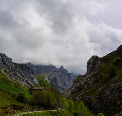 Driving narrow mountain road from Los Arenas to remote mountain village Sotres, Picos de Europa mountains, Asturias, North of Spain