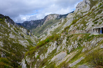 Driving narrow mountain road from Los Arenas to remote mountain village Sotres, Picos de Europa mountains, Asturias, North of Spain