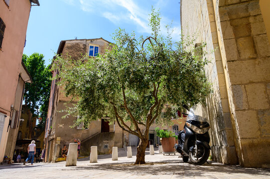 Travel destination, small ancient village Cotignac in Var, Provence, surrounded by vineyards and cliffs with troglodytes houses.