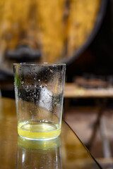 Tasting of traditional natural Asturian cider made from fermented apples in barrels for several months should be poured from great height, allowing lots of air bubbles into the drink.