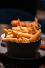 Dutch snacks for beer or wine, french fried potato chips and deep fried tempura shrimps and hot dip sauce