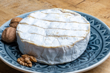 French soft Camembert cheese, original Camembert de Normandie