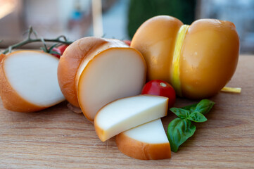 Italian semi hard handmade smoked scamorza cheese, from cow milk from Apulia or Calabria regions...