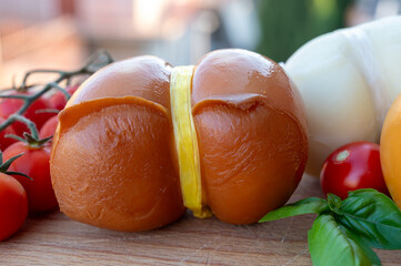 Italian semi hard handmade smoked scamorza cheese, from cow milk from Apulia or Calabria regions...