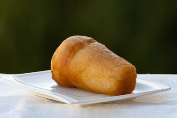 Fresh baked italian dessert homemade rum baba soft cake close up