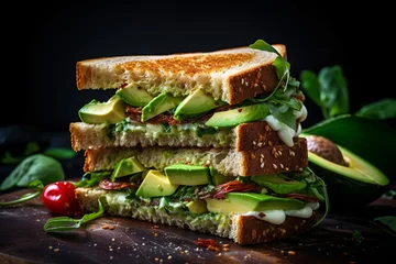 Tuinposter Yummy sandwich with avocado and white bread © Nadiia