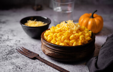 Creamy pumpkin mac and cheese in a bowl