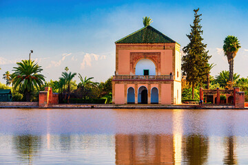 Obraz premium Colorful Saadian Pavillon at Menara gardensat sunset in Marrakech, Morocco