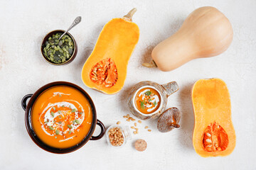 Traditional autumn butternut squash soup with seeds.