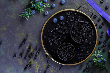 Obraz na płótnie Canvas Healthy Raw Dried organic Blueberries.