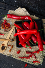 Red  hot chili pepper composition, spicy organic paprika background